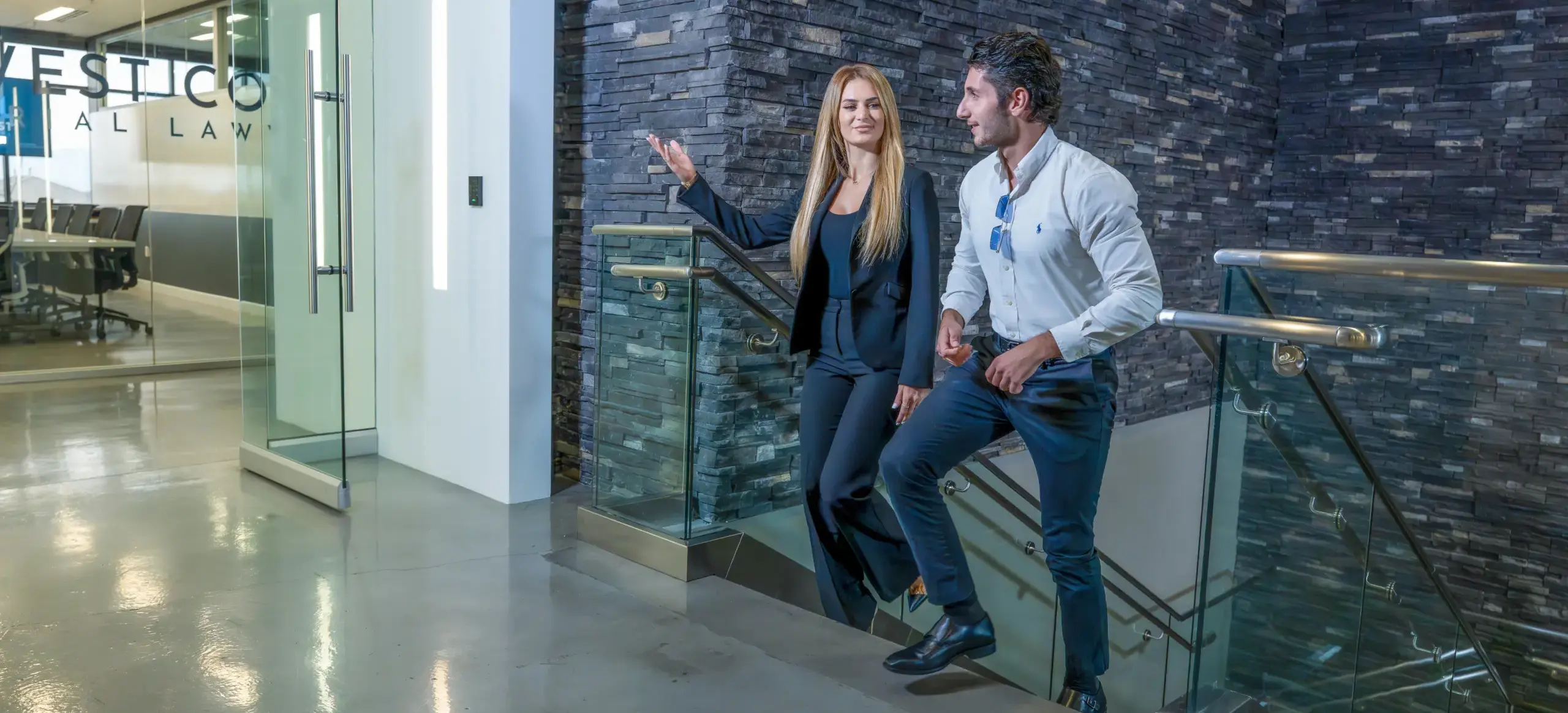 A WCTL attorney walking their client into the office.