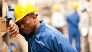 A depressed warehouse worker, collecting his thoughts.