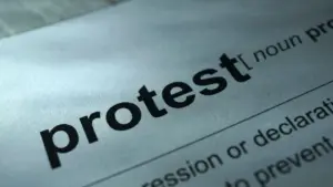 A close up of the definition of the word 'protest'. 