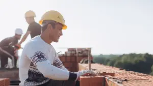 A constructed worker being punished for going against the dress code.