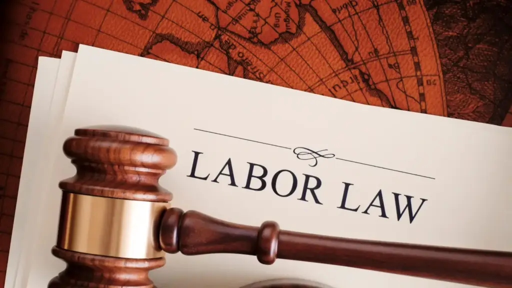 A Labor Law document with a gavel on top.