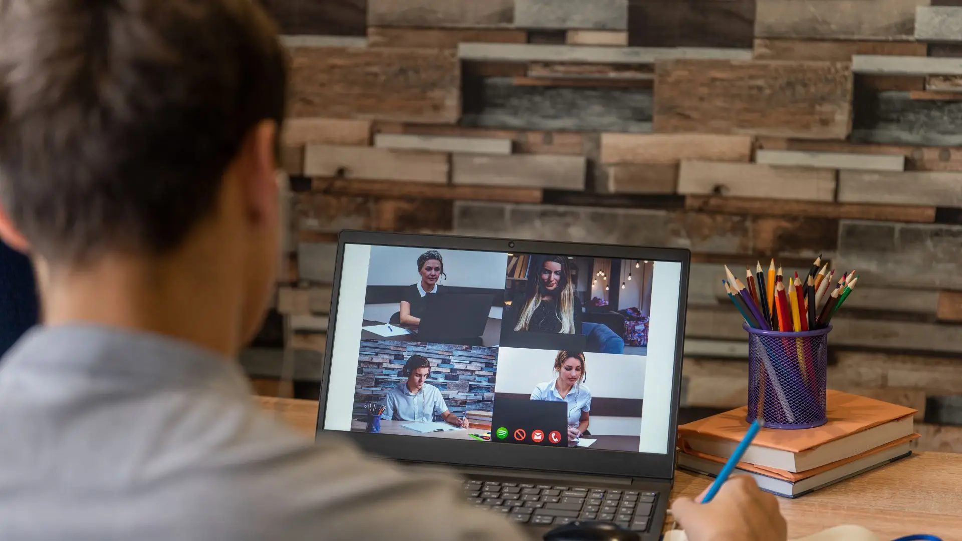 A man on a online work meeting.