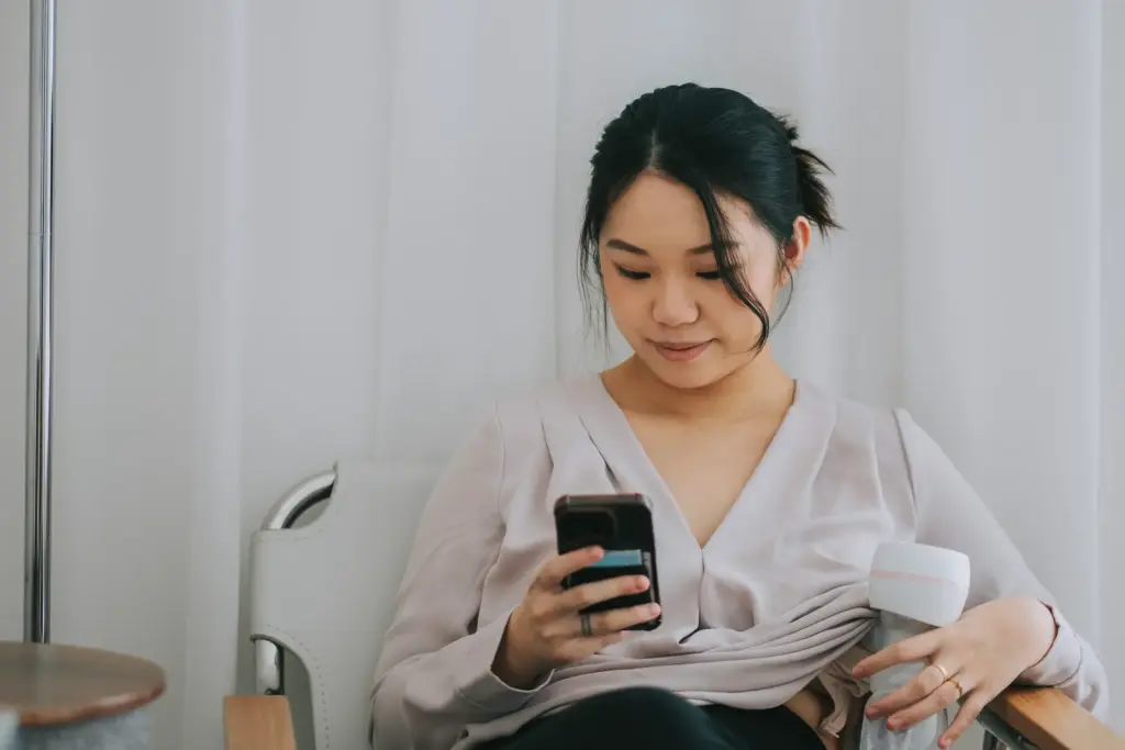 A working mother pumping breast milk while on the clock.