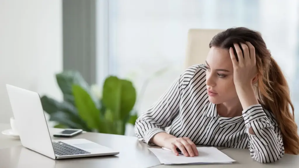 A overworked office worker doing the bare minimum.