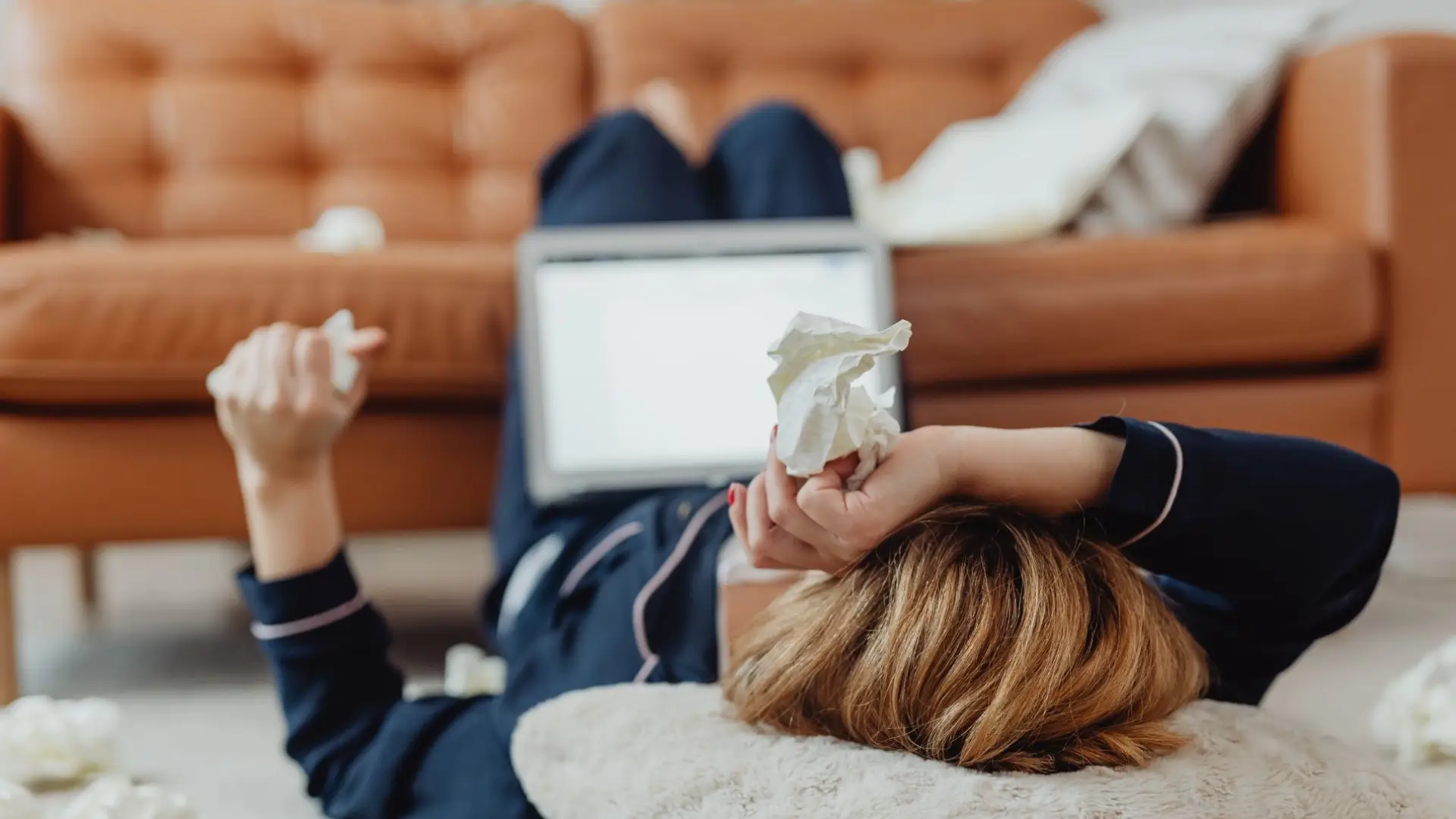 A sick remote worker questioning her rights.