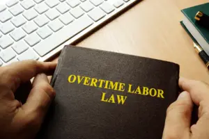 A book titled "Overtime Laws".