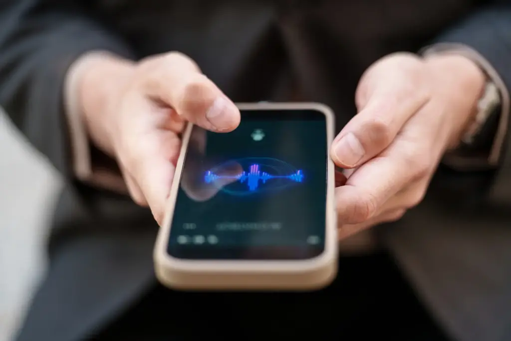 A worker setting up a voice recording.