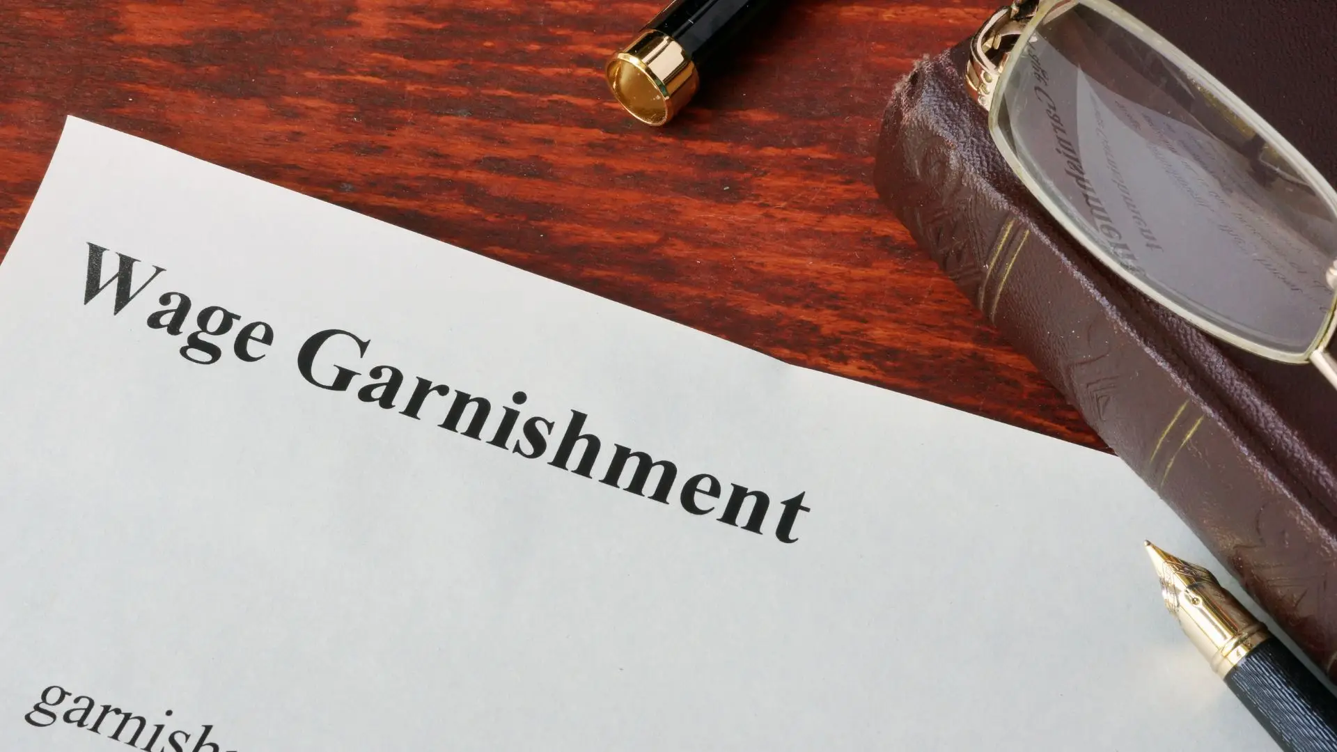 A wage garnishment order on a table.