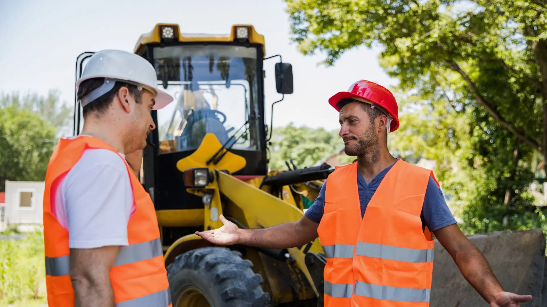 Two construction workers arguing.