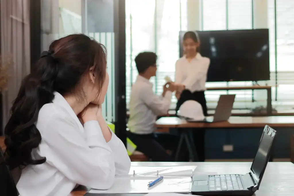 A hostile work environment where an employee is purposefully getting left out. 
